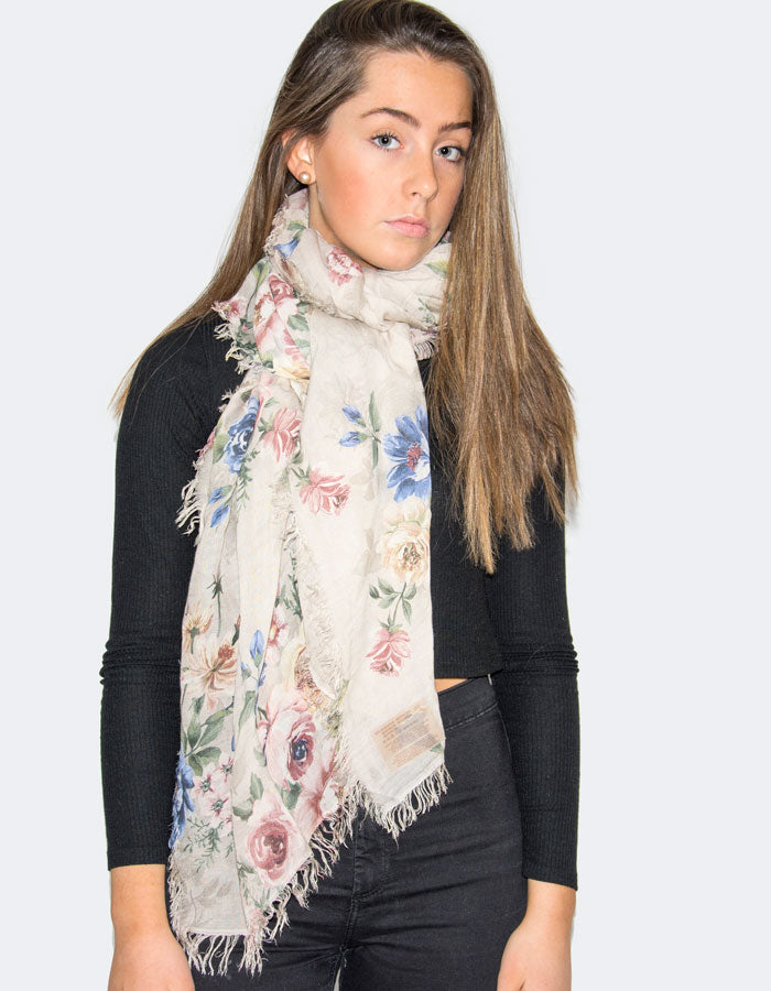 A photograph showing a pretty flowers Italian micromodal scarf