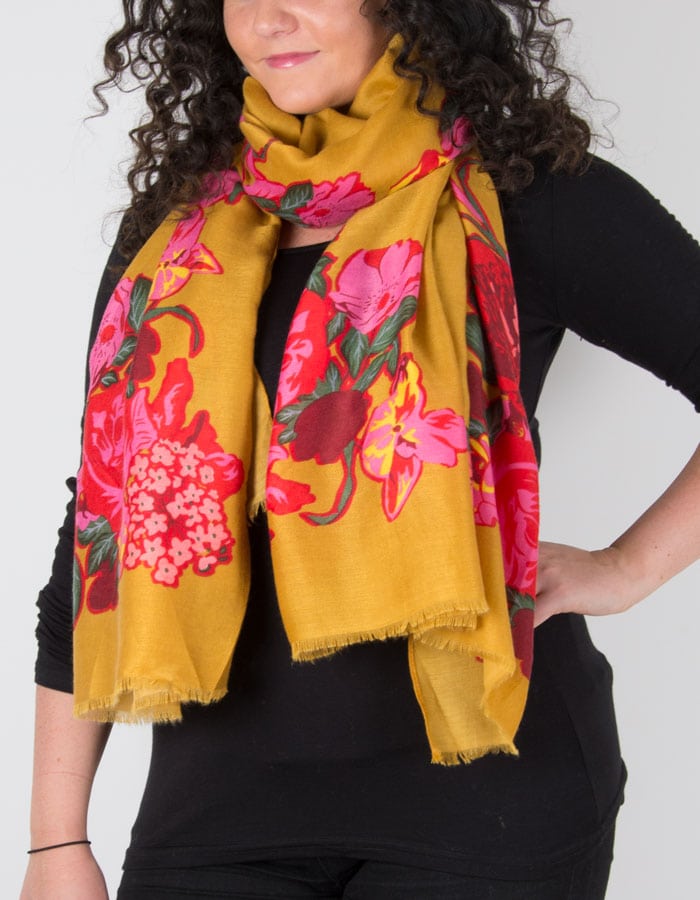 A photograph showing a floral yellow scarf