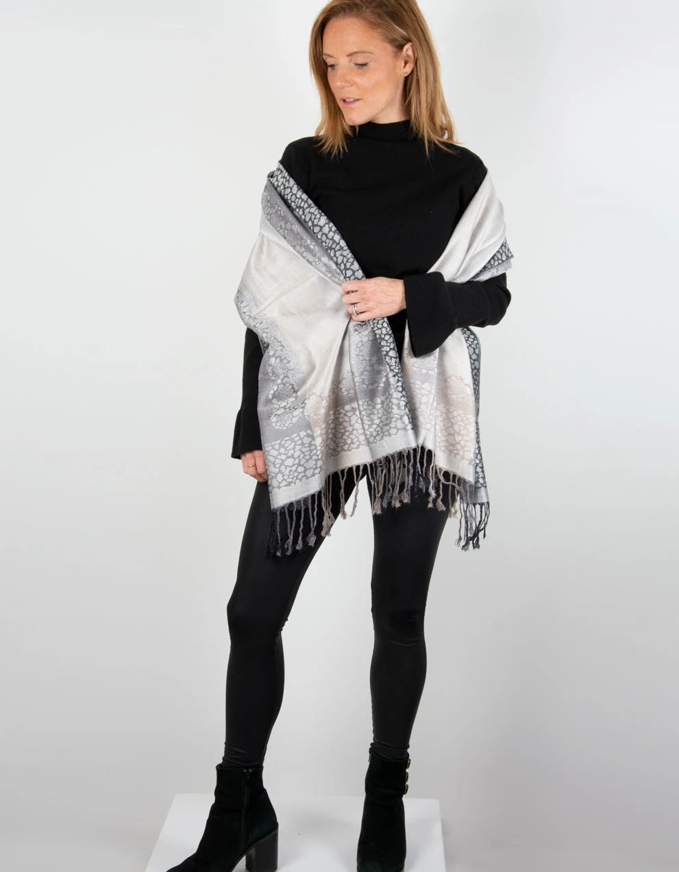 an image showing animal print pashmina black grey