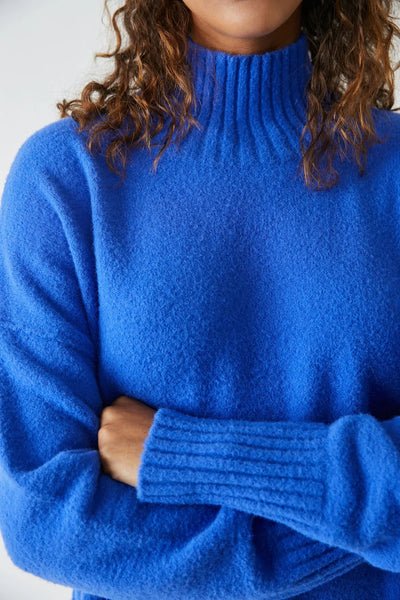 cobalt blue turtleneck sweater