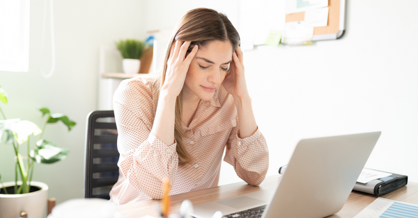 Woman Stressed at Her Computer
