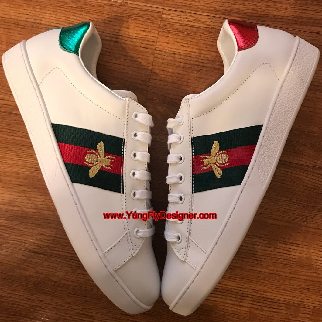 gucci fly logo