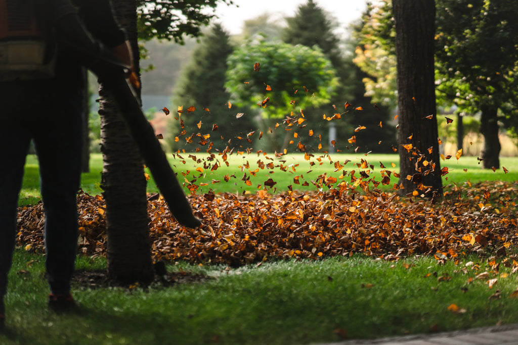 Blowing leaves, dirt and debris with an industrial leaf blower. Schröder USA