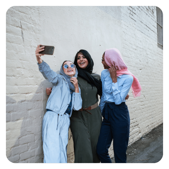 three_women_taking_selfie