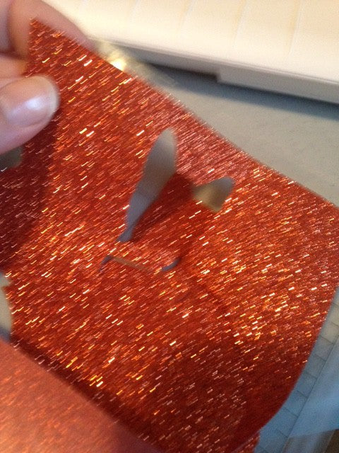 Cutting glitter HTV without a backing sheet. 