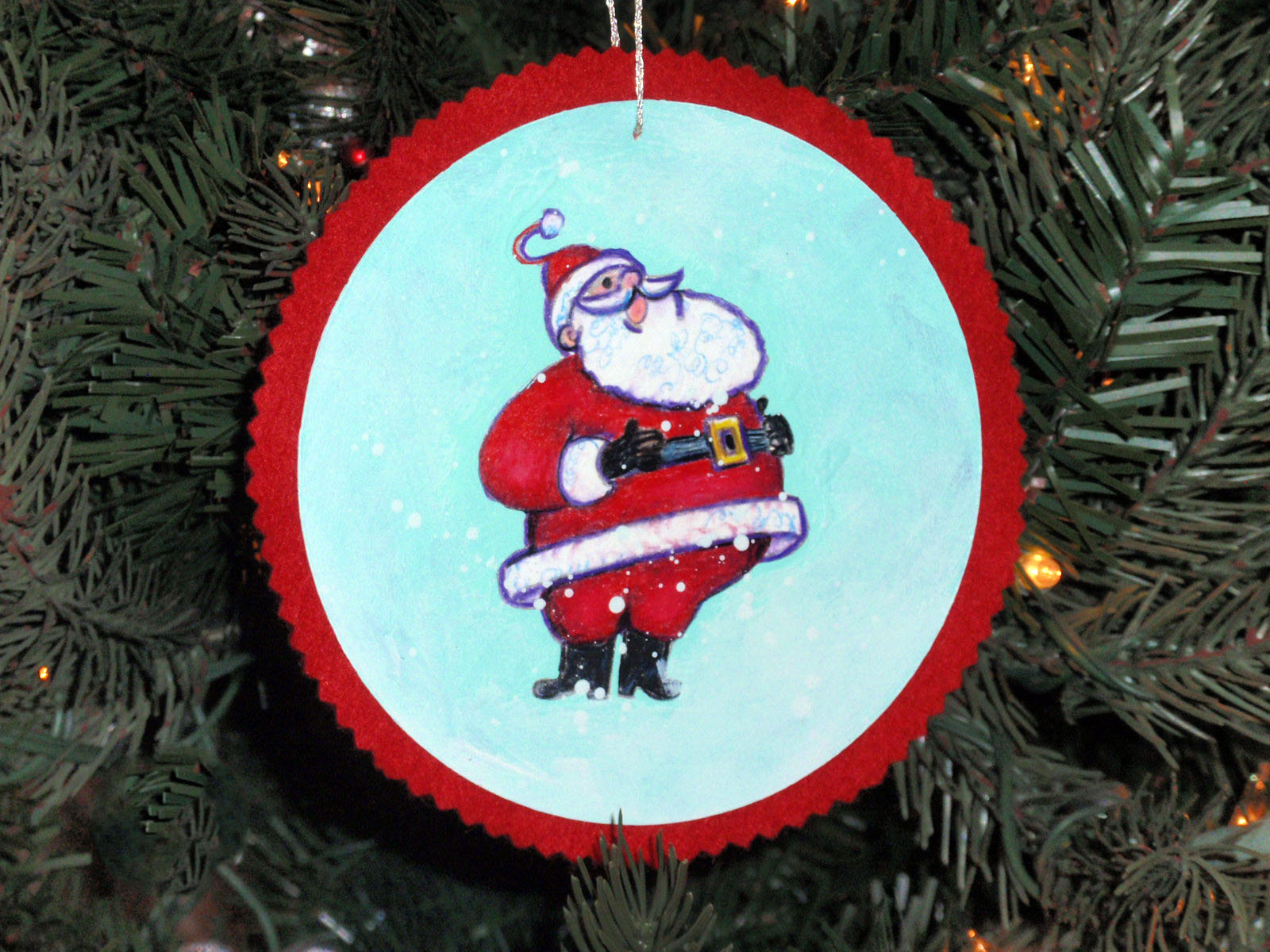 santa ornament hanging on tree