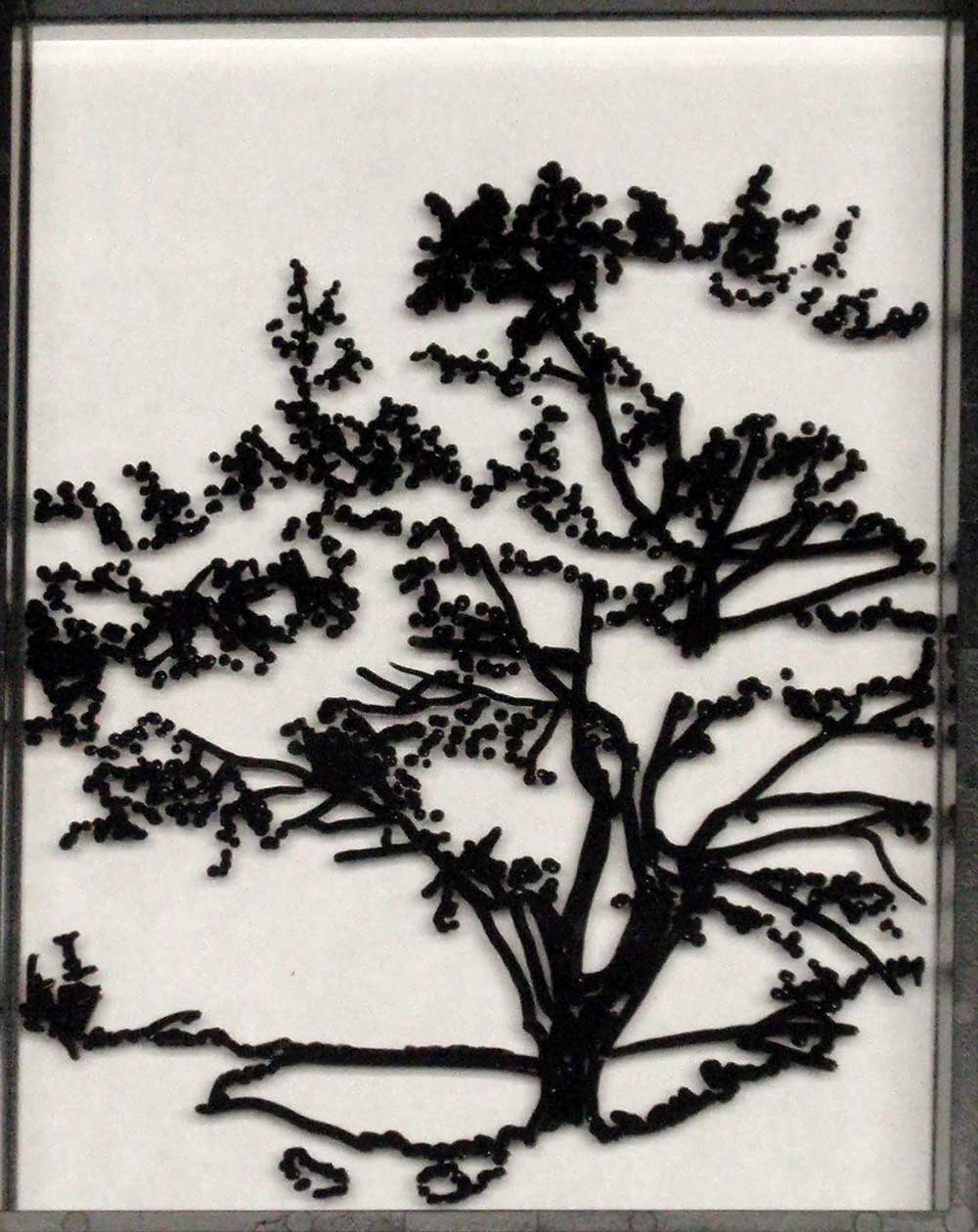 Begin painting tree on glass
