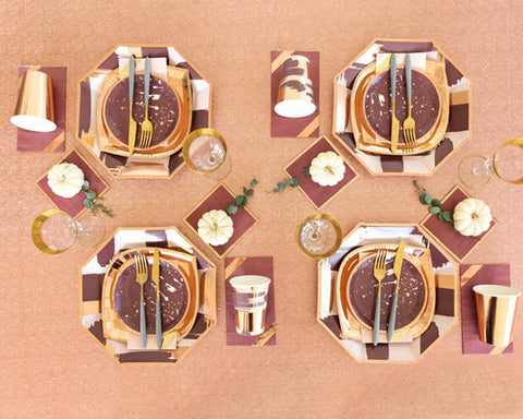 rose gold, mauve, blush, eggplant splatter printed tableware set up for a dinner of 4 people