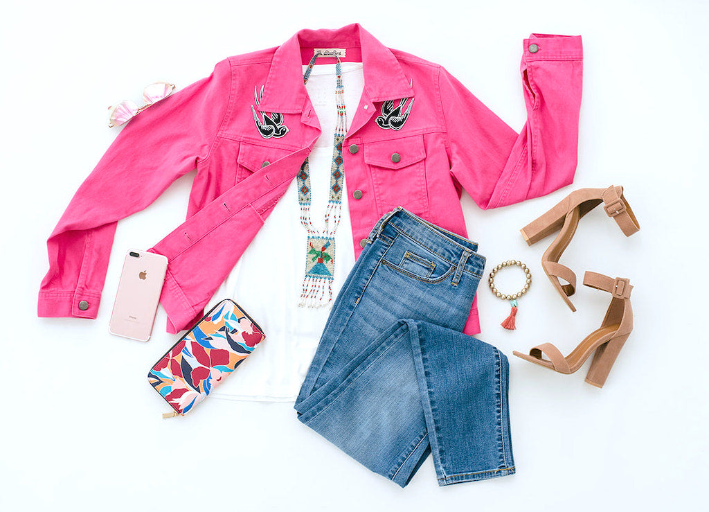 bright pink denim jacket with embroidered bird patches