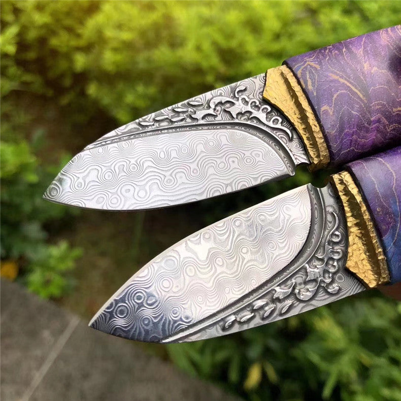 The phantom Olive Damascus steel pocket knife