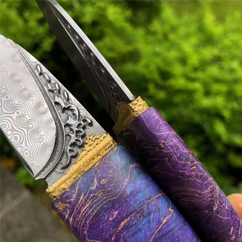 The phantom Olive Damascus steel pocket knife