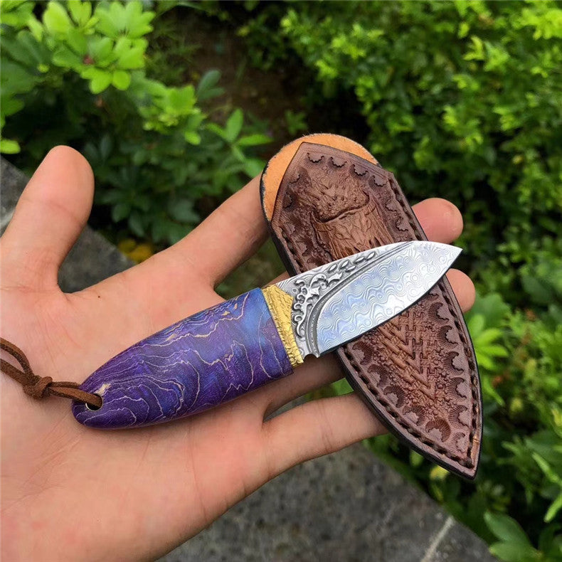 The phantom Olive Damascus steel pocket knife