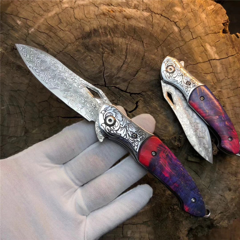 The Rainbow Eagle Damascus steel folding knife