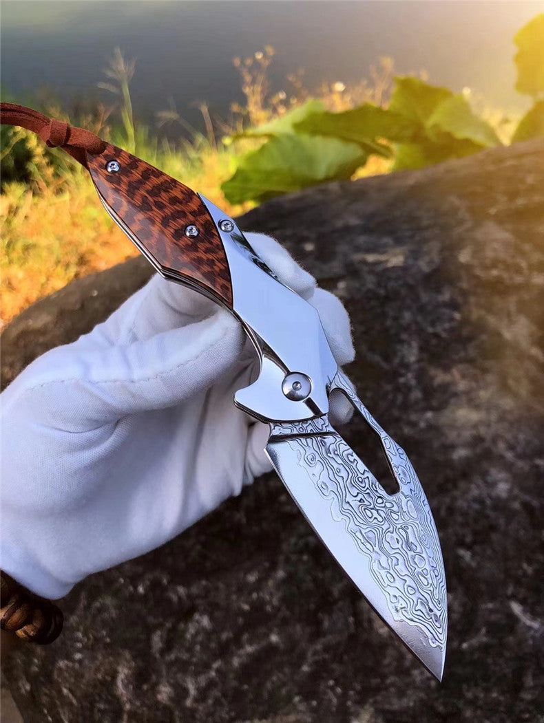 The Robot Hunter Damascus steel folding knife