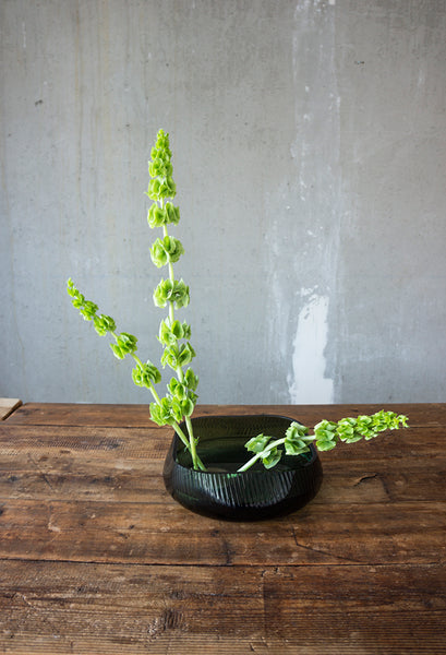 The creation of the 3 flower stems on the kenzan in NUDE's Opti centerpiece