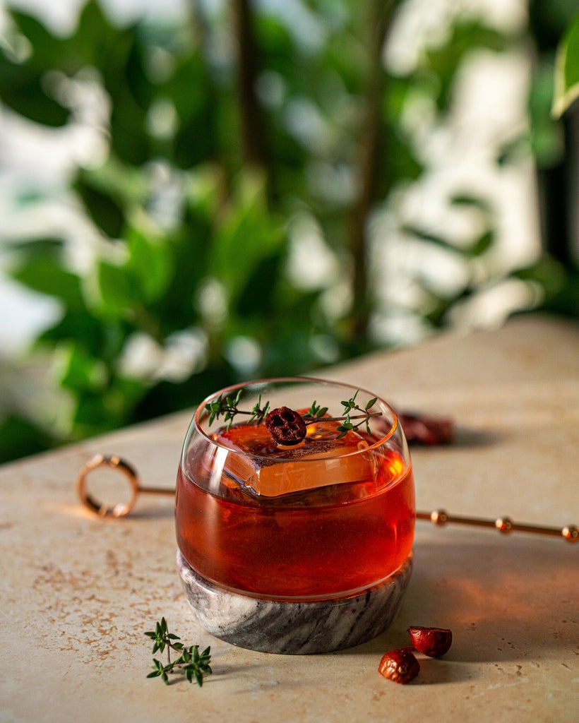 Festive cocktail Apple, Cranberry and Maple Negroni in Chill glass by NUDE