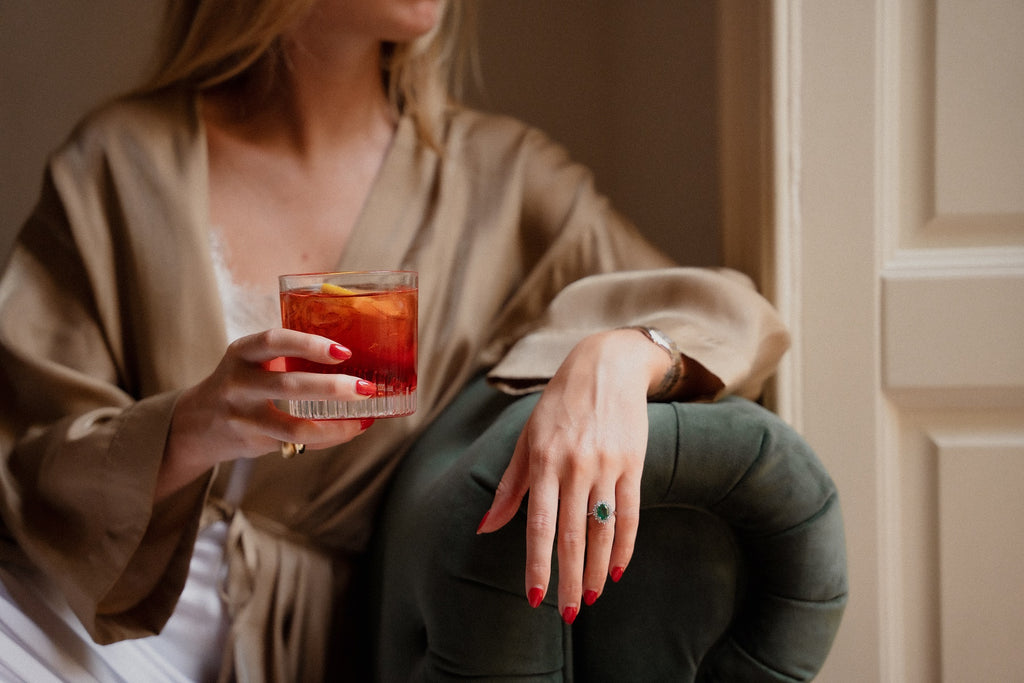 Clara enjoying a Negroni in a NUDE Glass Caldera lowball glass