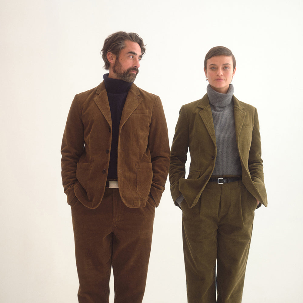 A man and woman wearing Alex Mill corduroy suits