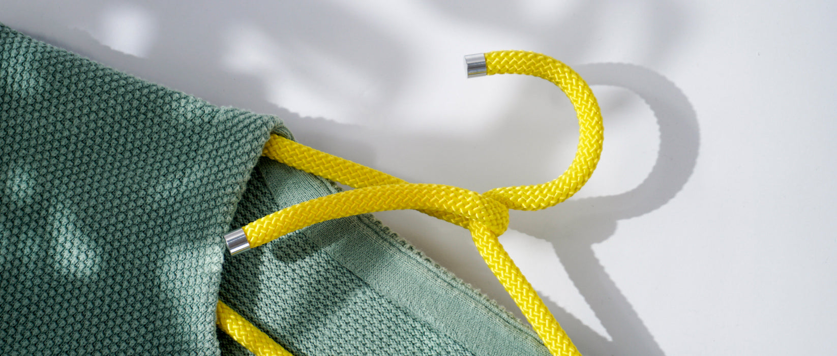 Yellow rope hanger by Peppermint Products