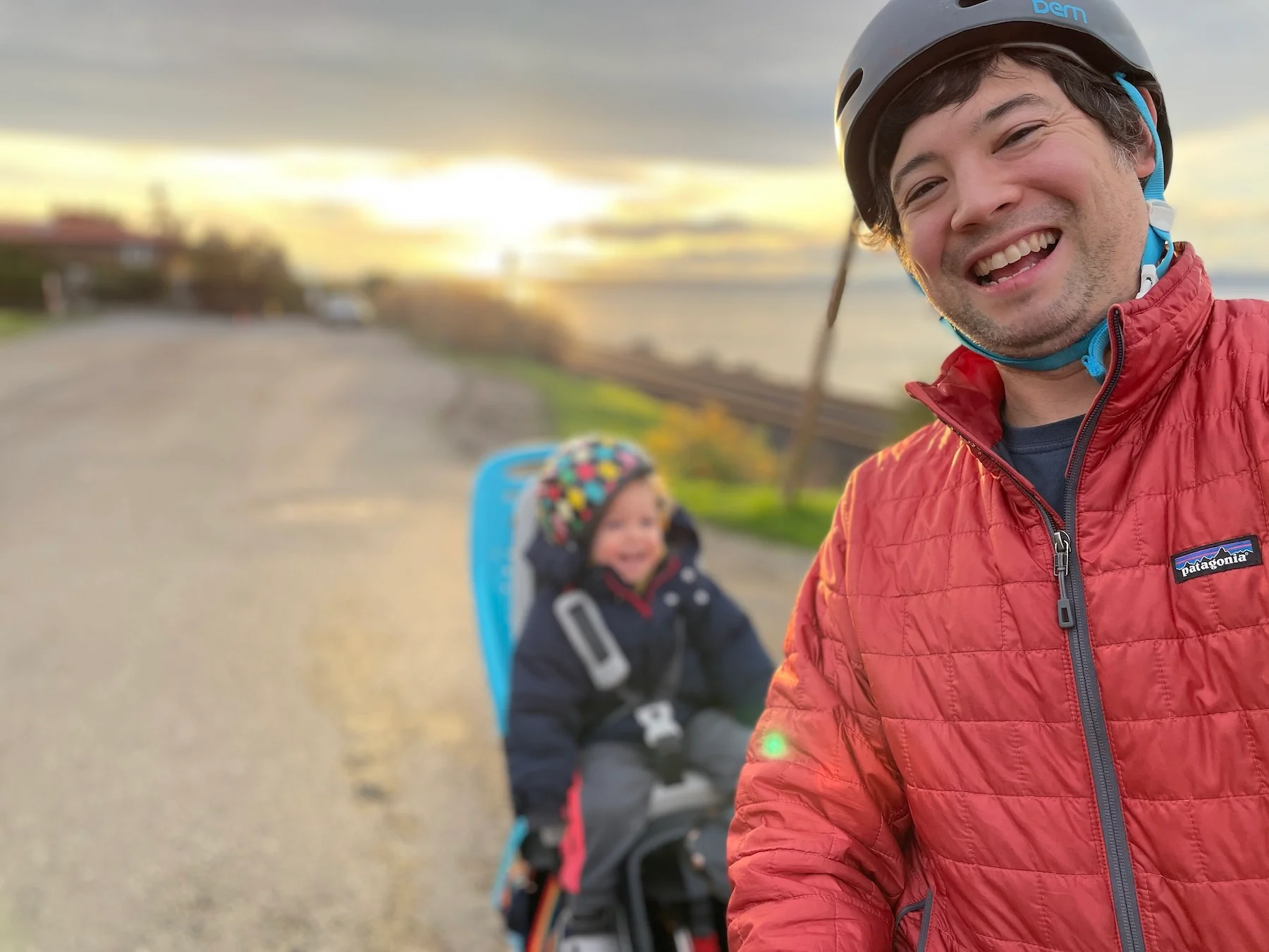 Authenticity50 founder Jimmy MacDonald biking with his son on Cyber Monday