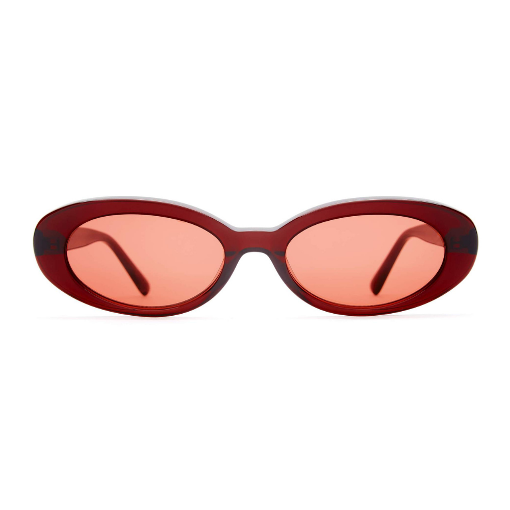 The Sweet Leaf Sunglasses from Crap Eyewear, with a round dark red frame and rose colored lenses