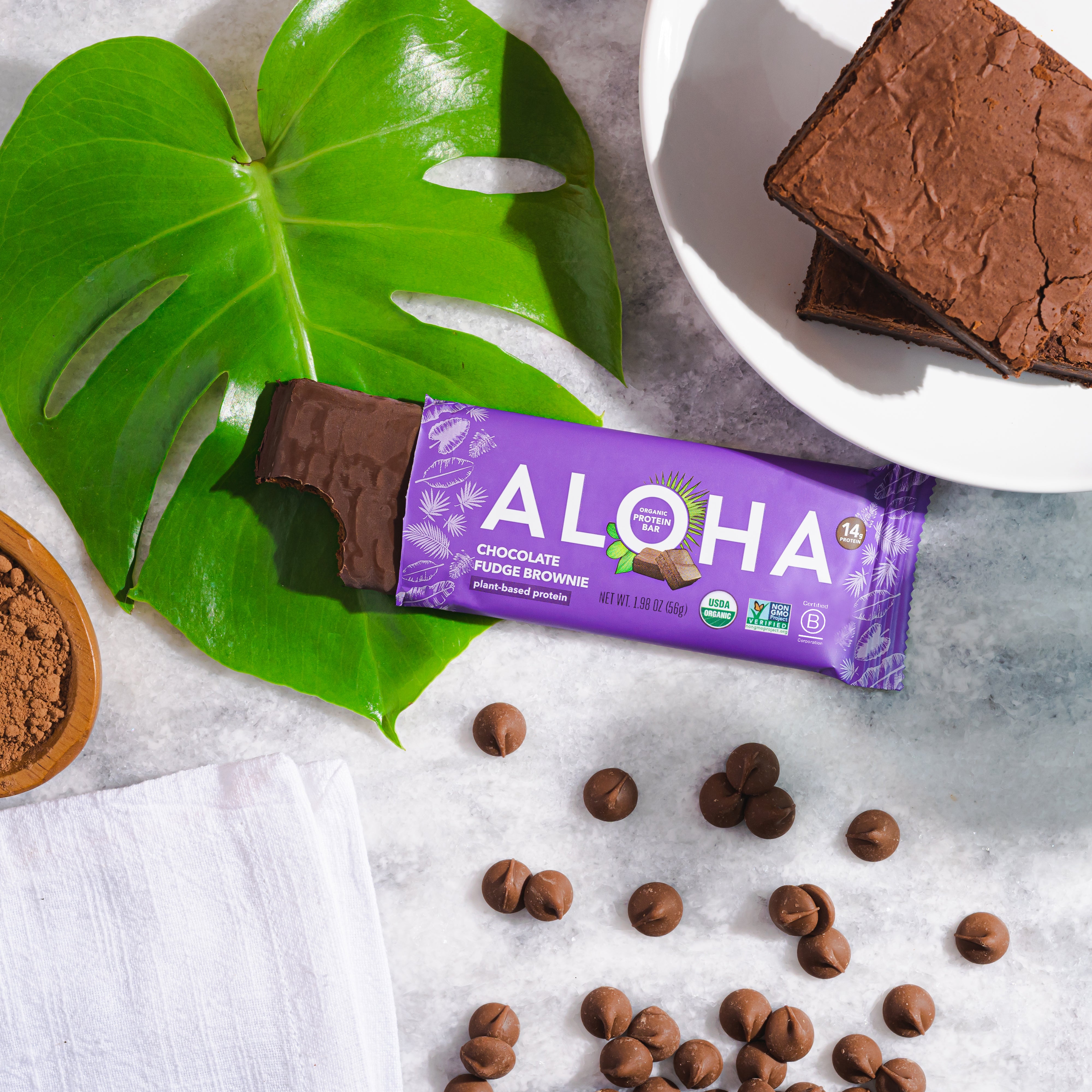 An Aloha bar with a monstera leaf and chocolate chips