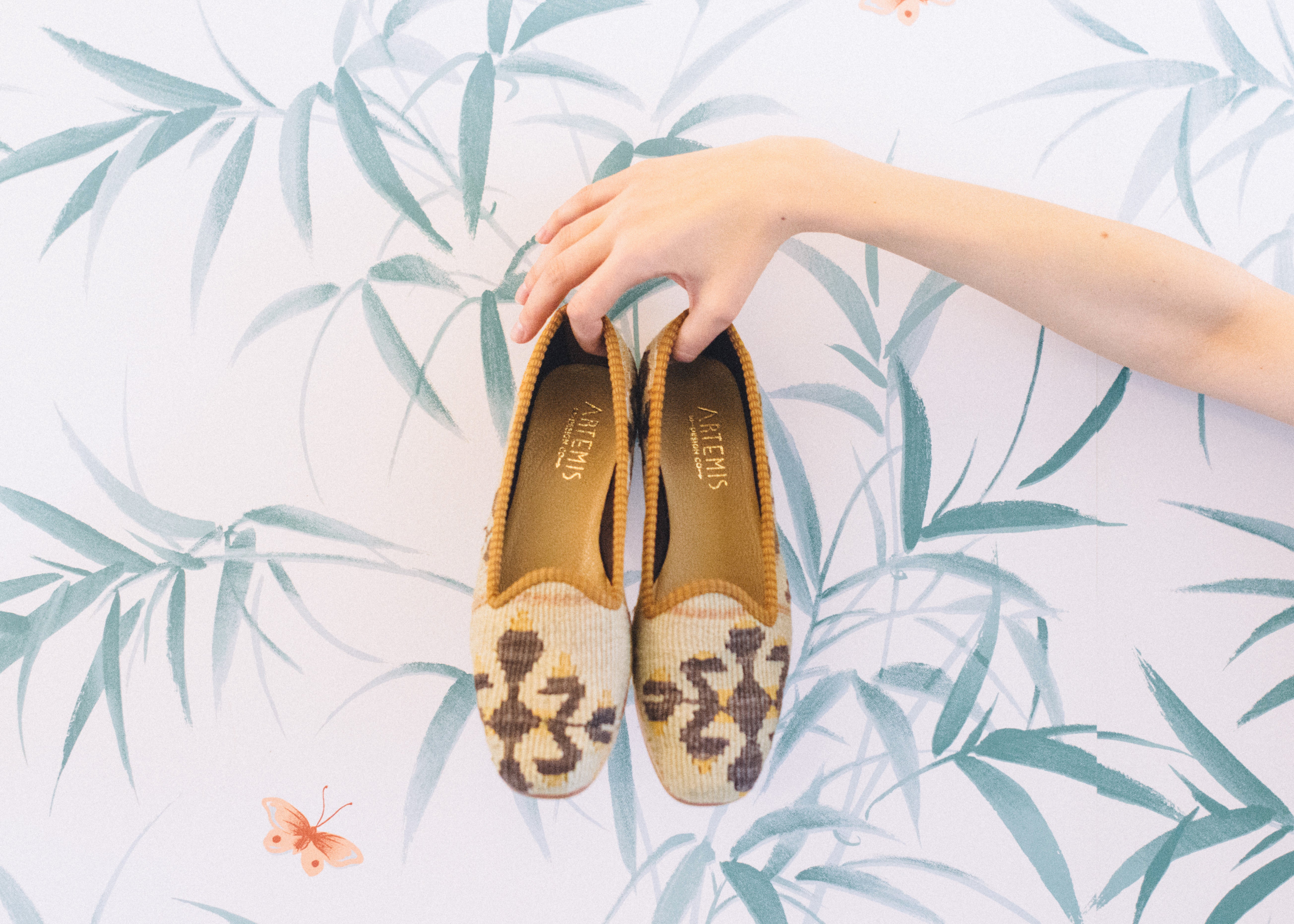 A styled shot of Kilim loafers from Artemis Design Co