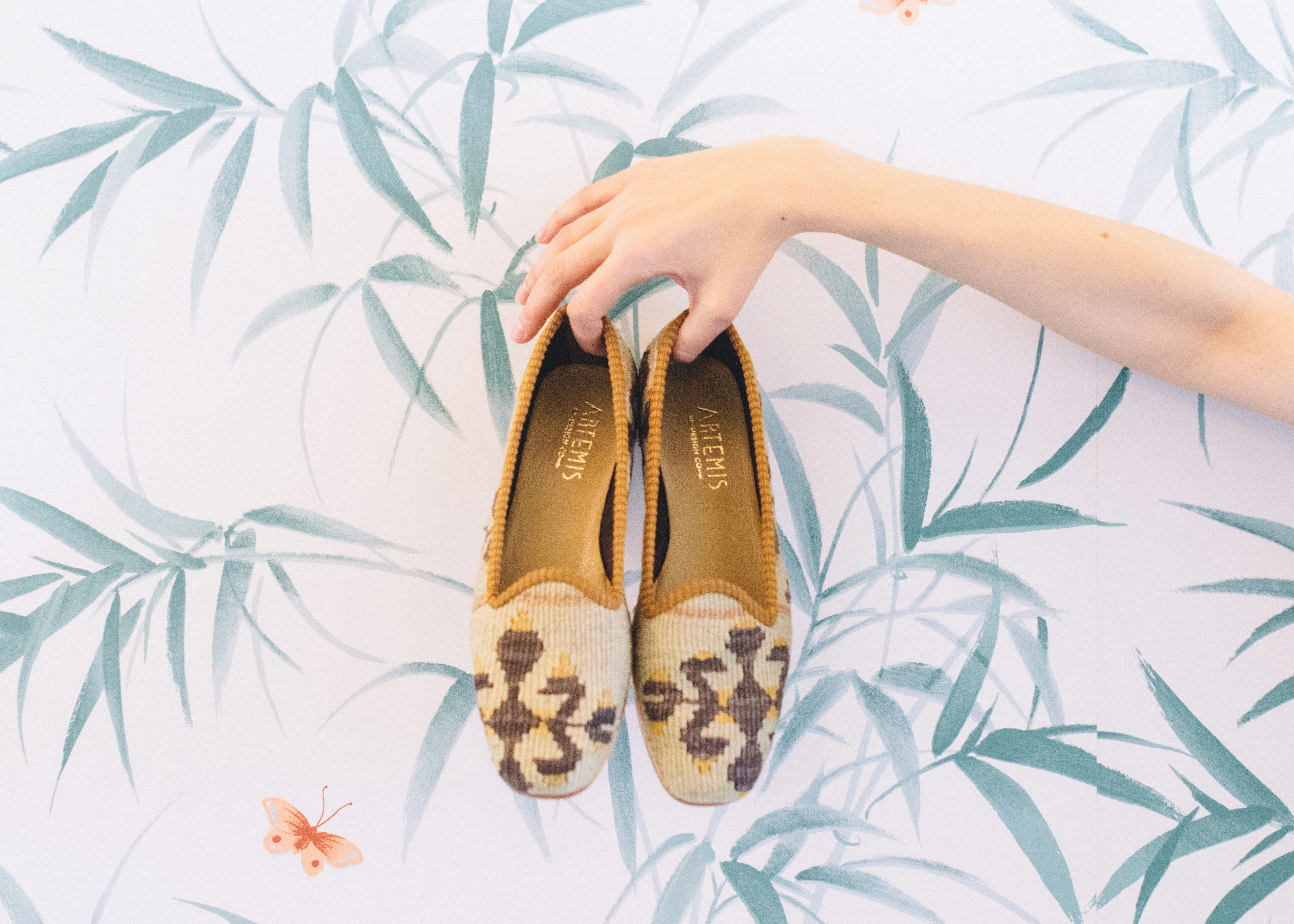 A styled shot of Kilim loafers from Artemis Design Co