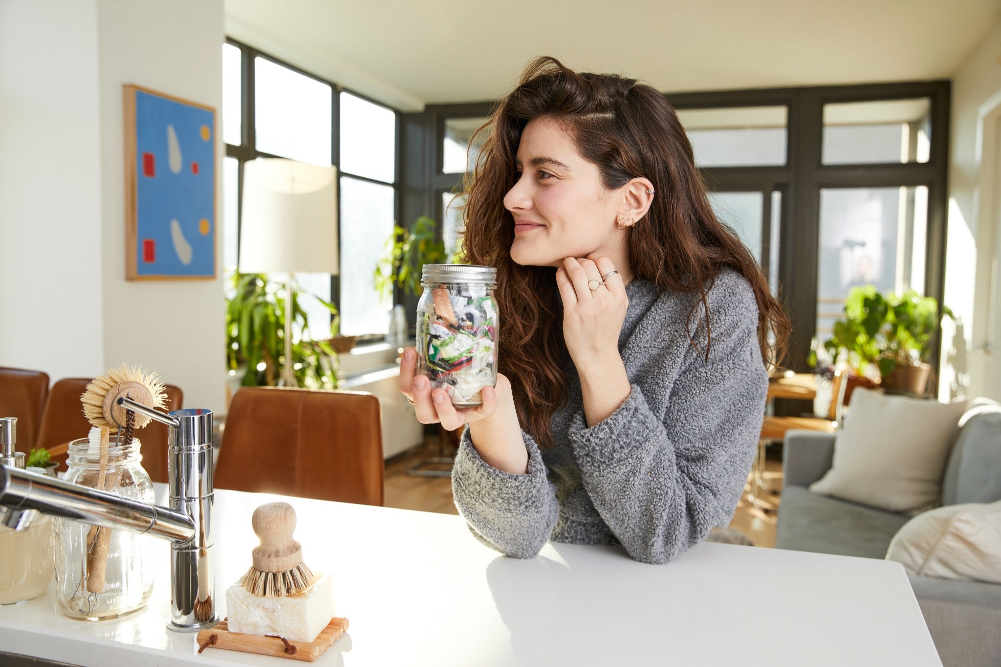 Lauren Singer with her Mason jar that contains all the waste she made in three years. 