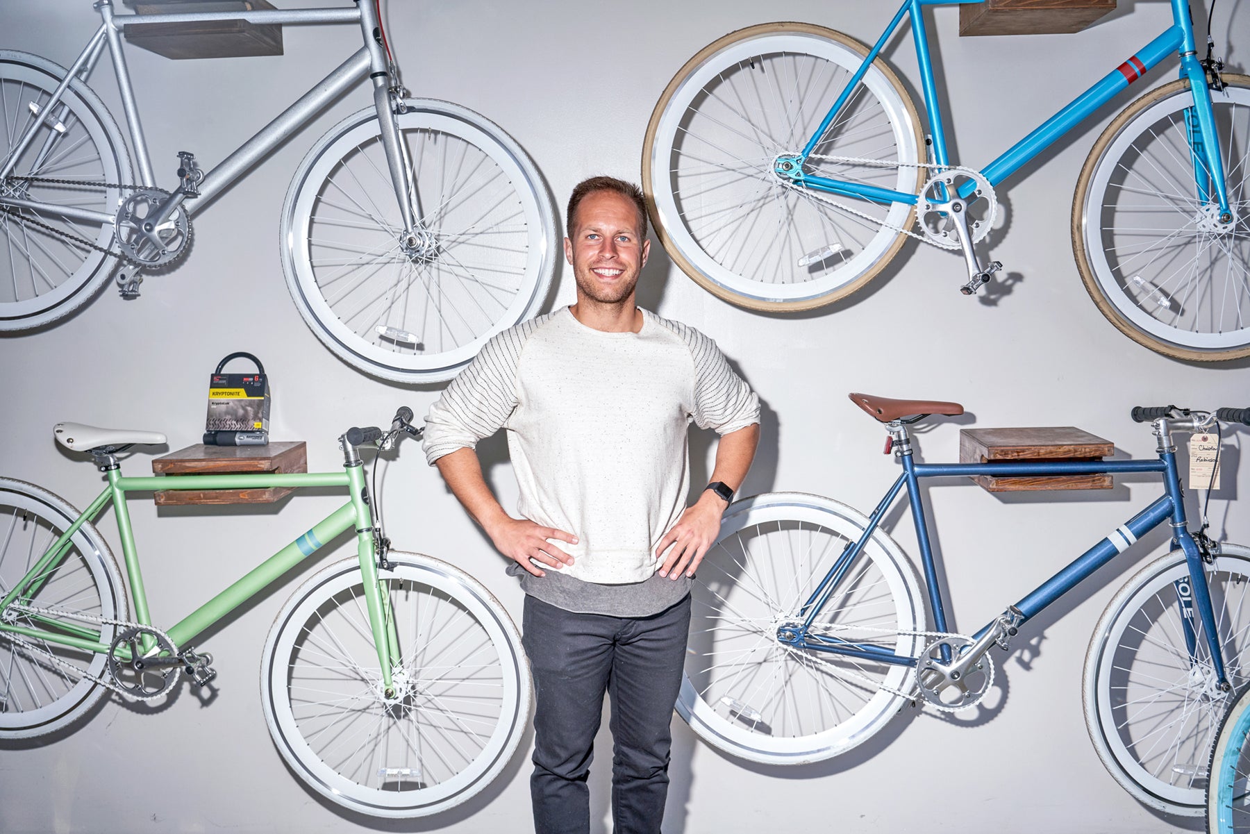 Jimmy Standley, president of Solé Bicycles, standing in his Venice, California bike shop.