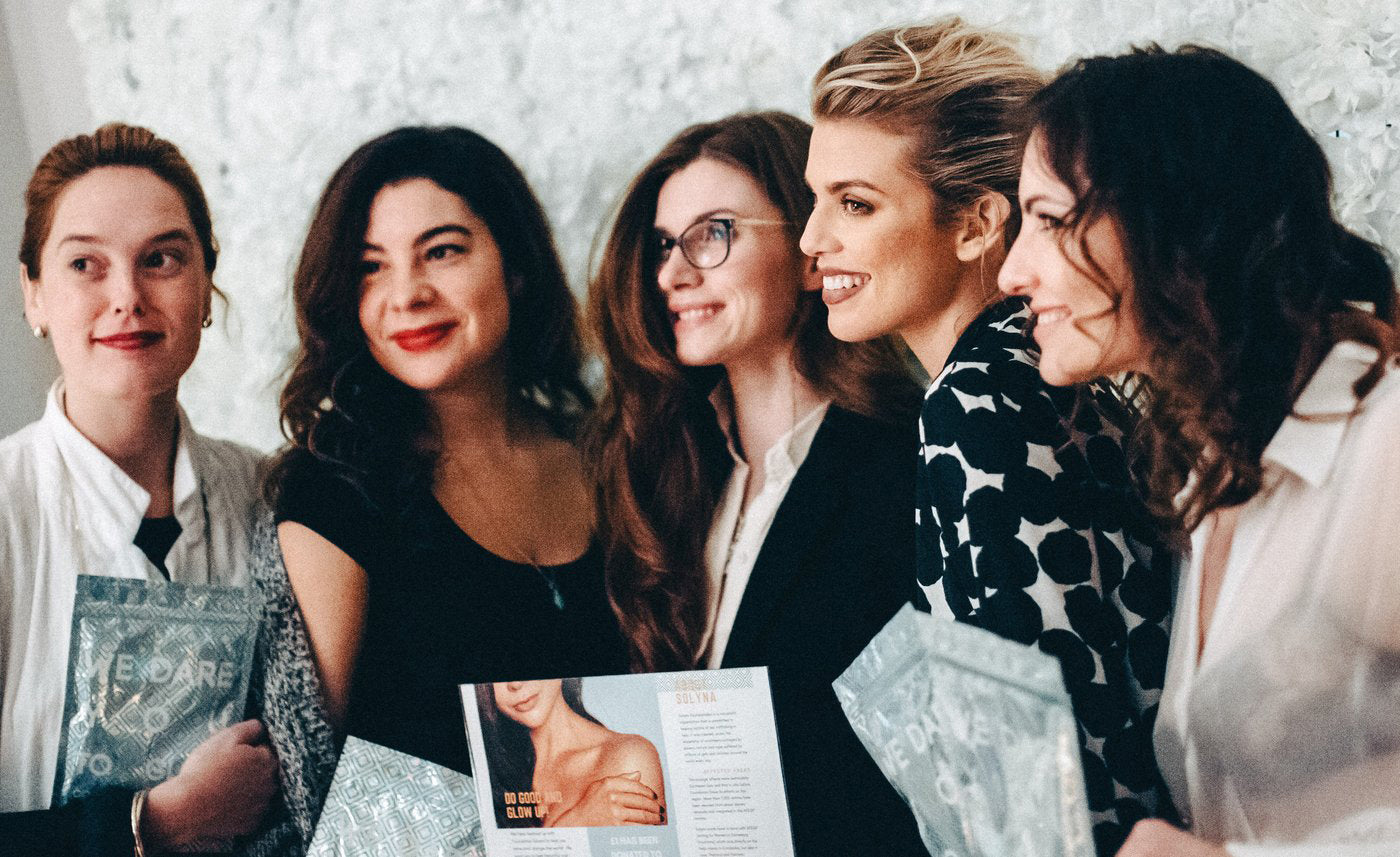 Women of Solyna Foundation, a nonprofit helping victims of sex trafficking in Asia, pose for a photo at a Vitaclean fundraing event.