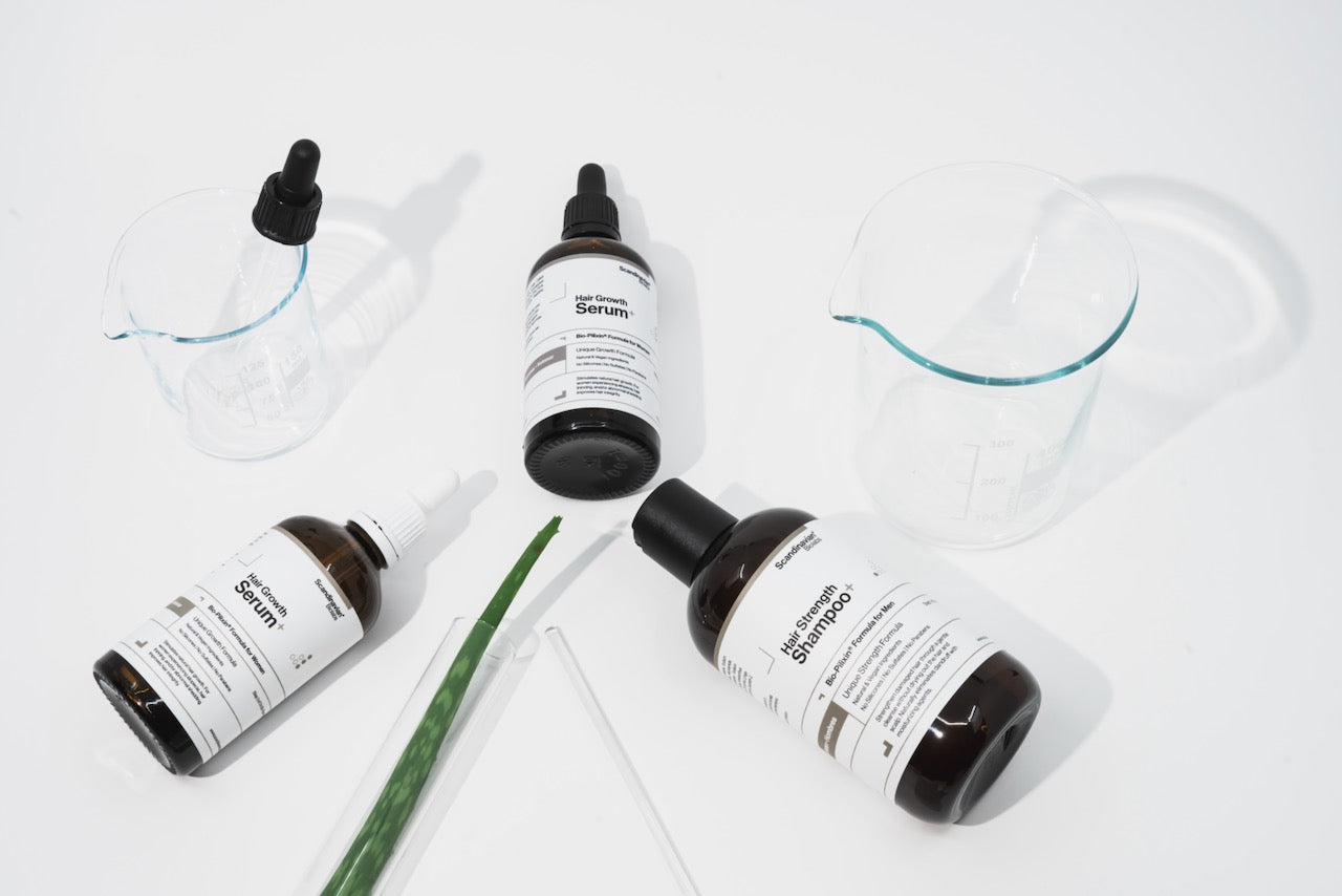 Various hair products by Scandinavian Biolabs, a cosmetics company powered by Blazar Capital. 