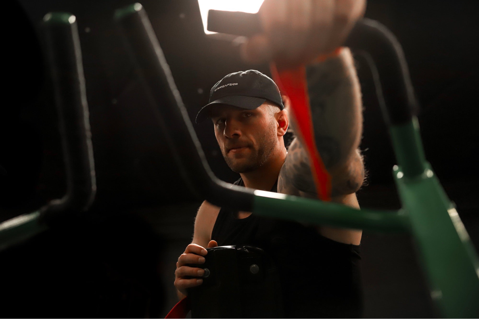 A gym goer working out in Gymreapers attire.