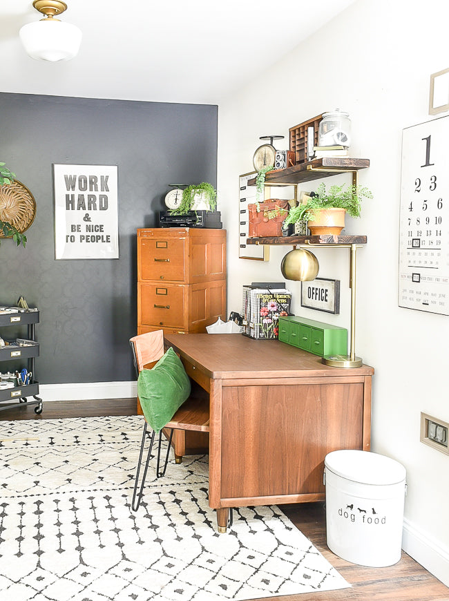 A home office with a mix of vintage and modern decor