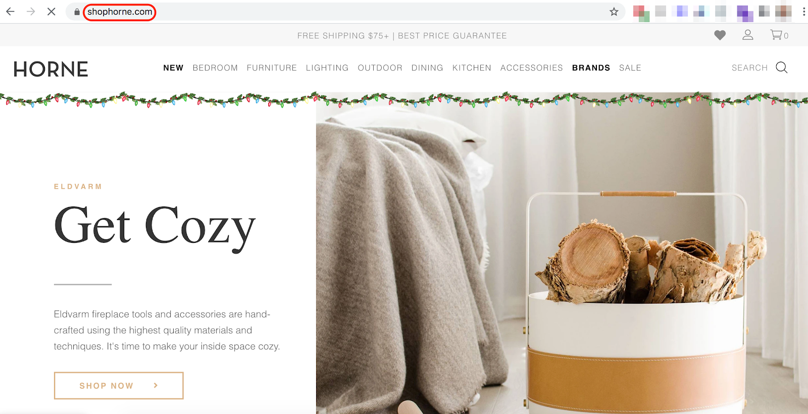 homepage of shopdotcom with a lifestyle livingroom image featuring a blanket and the words, get cozy