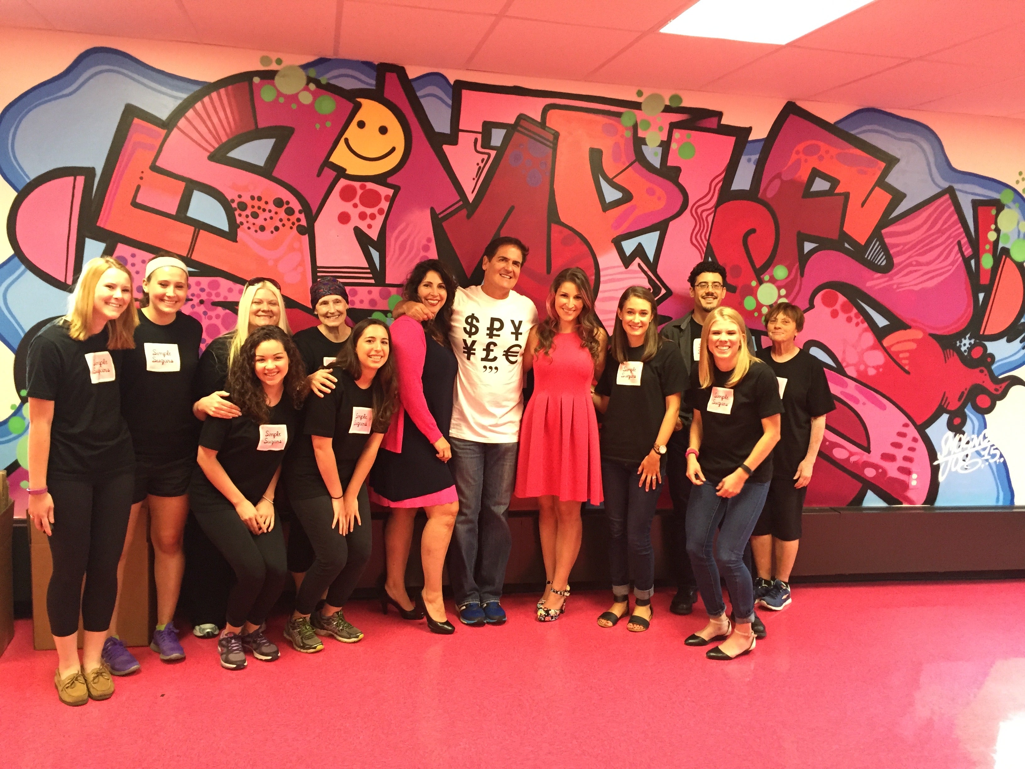 Mark Cuban, along with the Simple Sugars team, while filming their “Beyond the Tank” episode. 