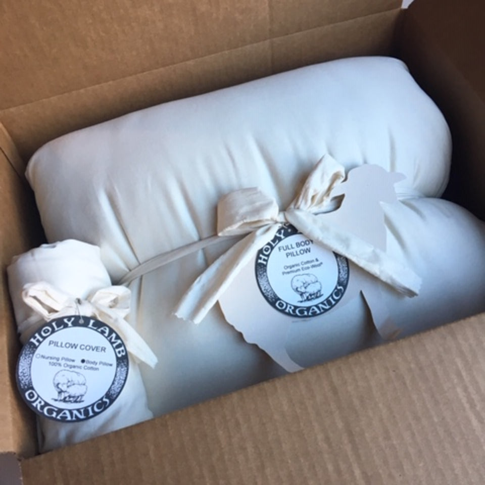 Pillow and pillowcase by Holy lamb Organics. 