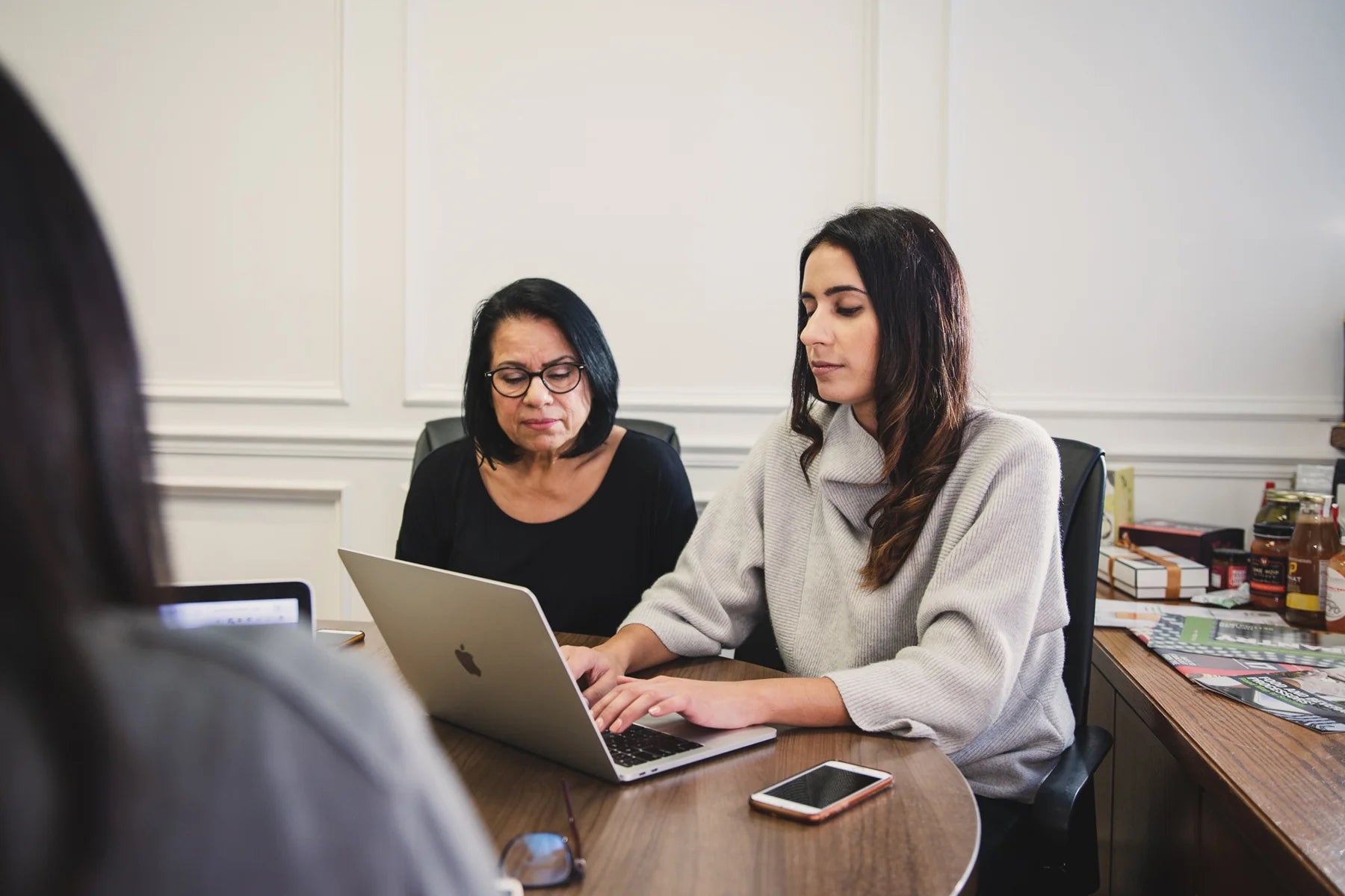 Jaswant Kular and her daughter work together on a laptop