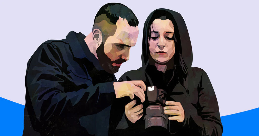 Illustration of a person helping another person use a camera