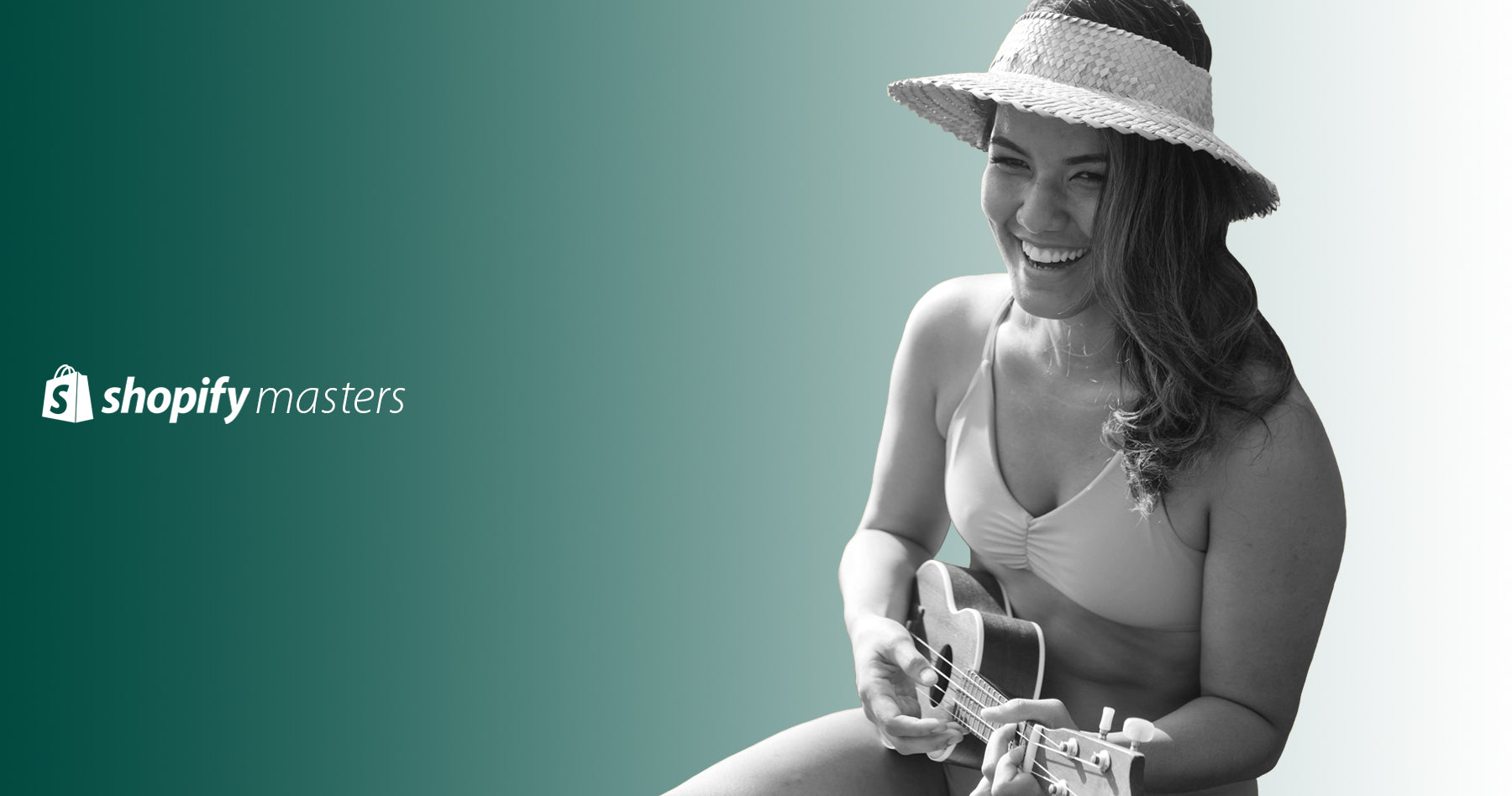 Founder of Fused Hawaii, Roxelle Cho in one of her own bikinis playing a ukulele.  