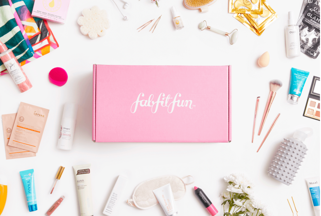 An array of products on a table from a FabFitFun box
