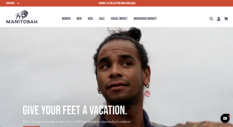 Homepage for Manitobah.com featuring product categories and a hero image of a person's face.