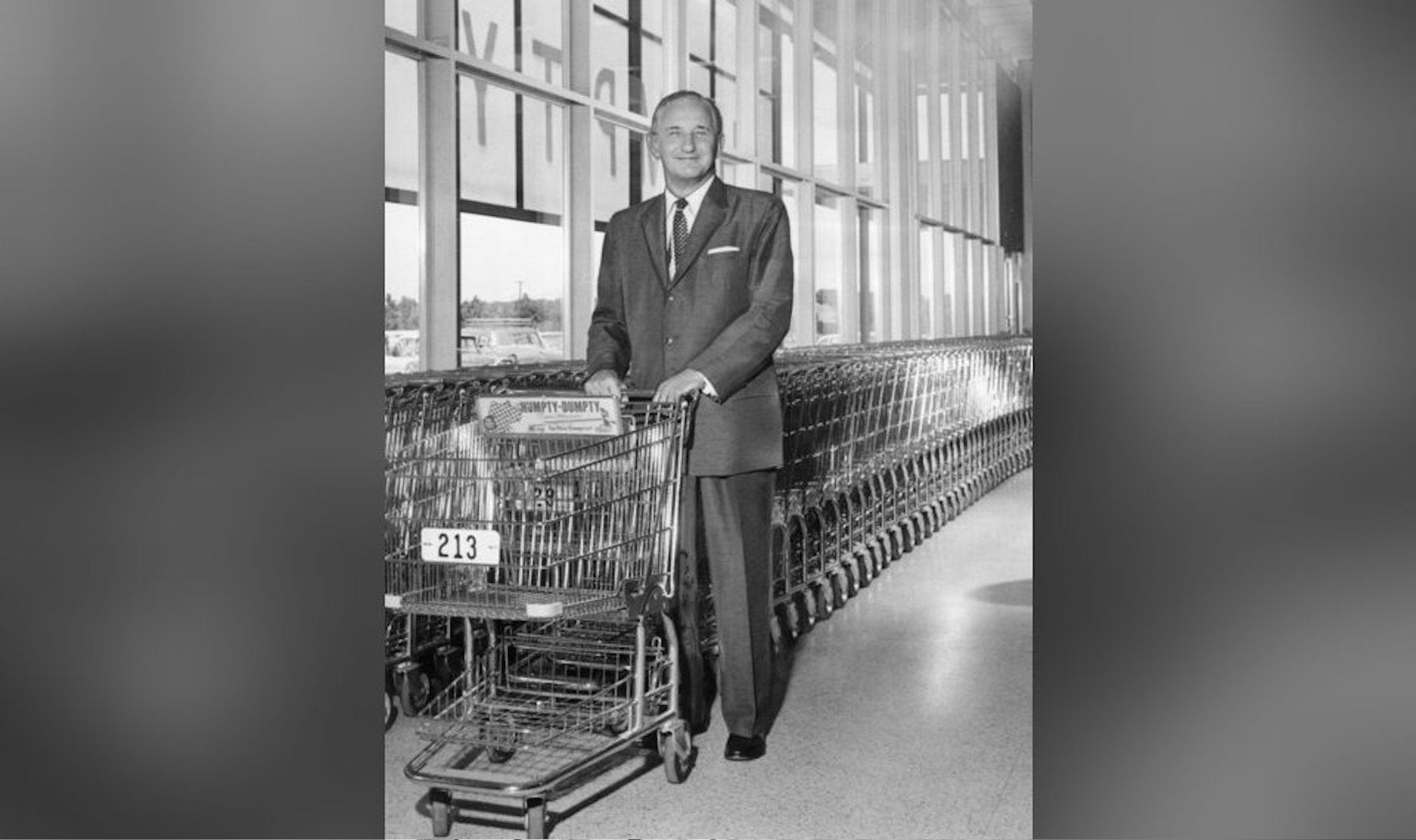 Sylvan N. Goldman, inventor of the shopping cart, is pictured with a shopping cart.