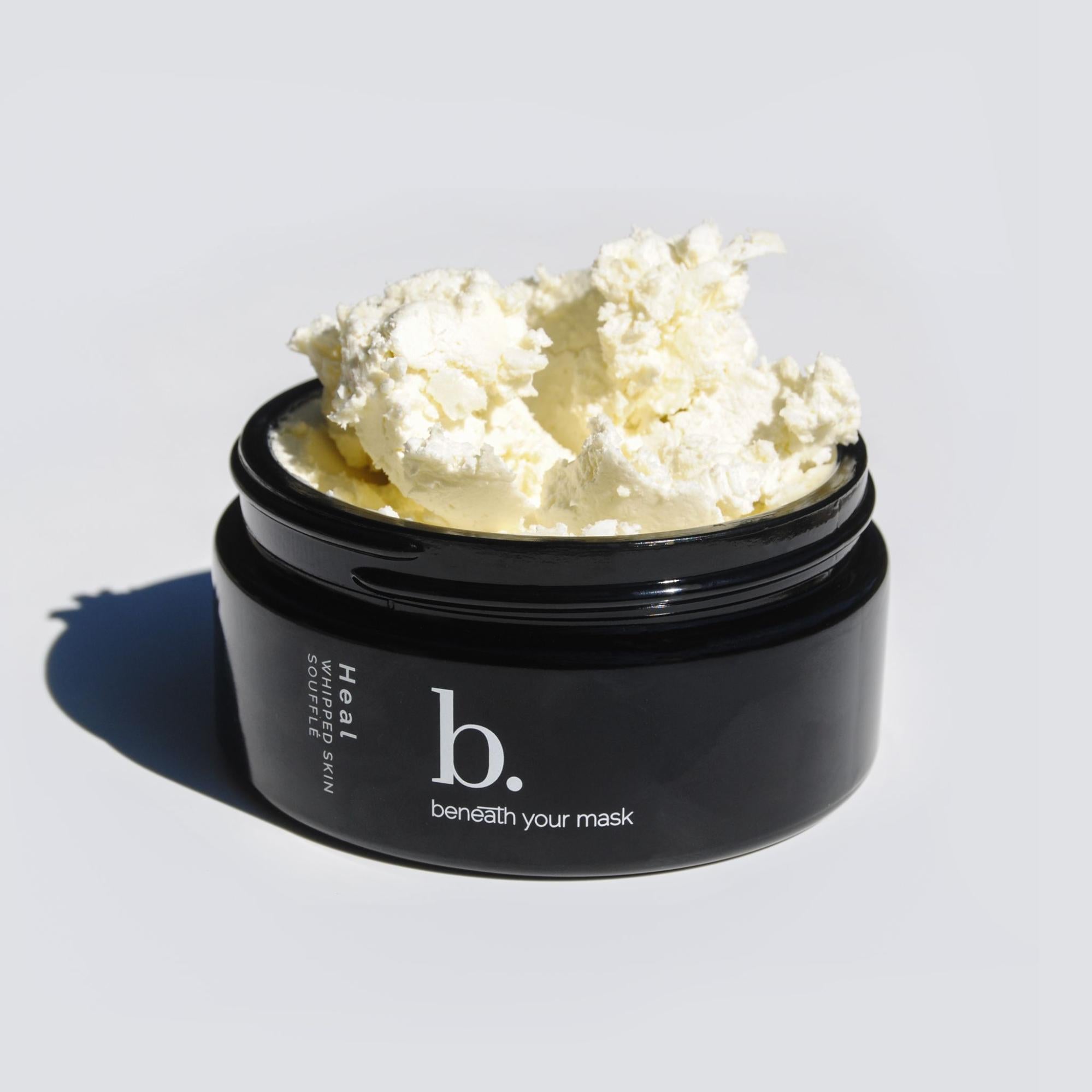 A container of whipped body butter from Beneath Your Mask.