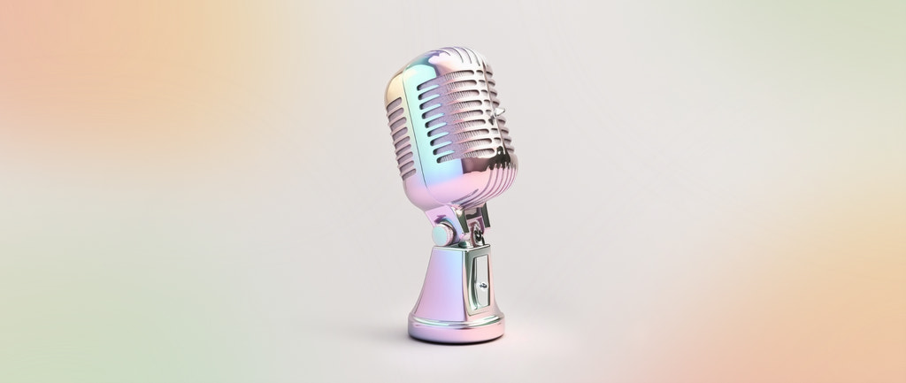 a shiny silver microphone ready to produce the best business podcasts