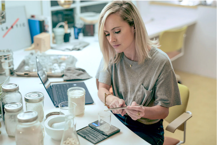 Image of Bite’s founder Lindsay McCormick working with samples of the product.