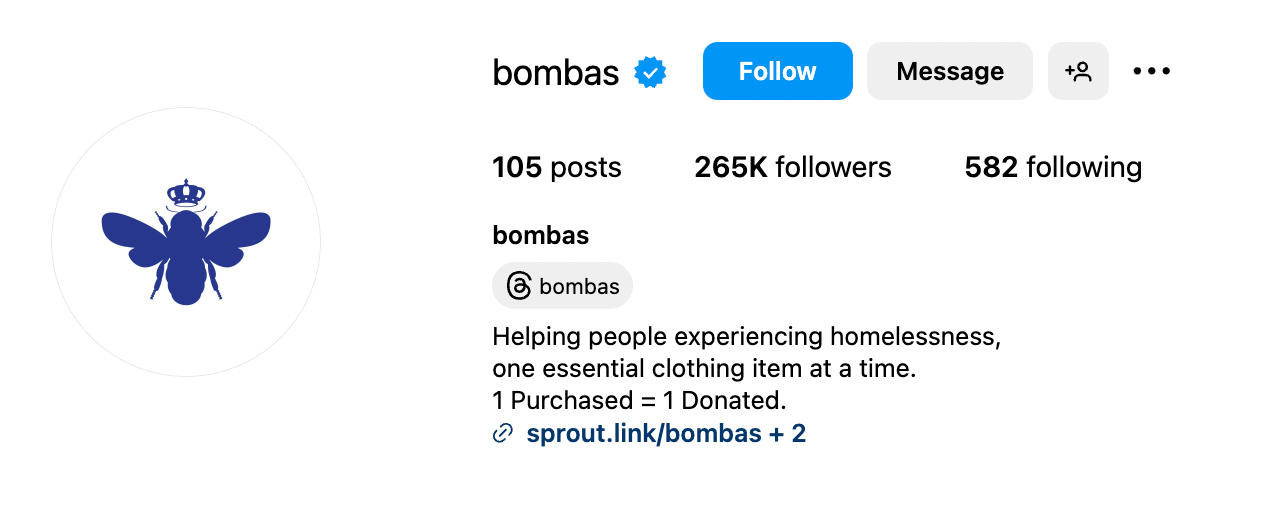 Bombas’ bio with its logo of a blue bee wearing a crown.