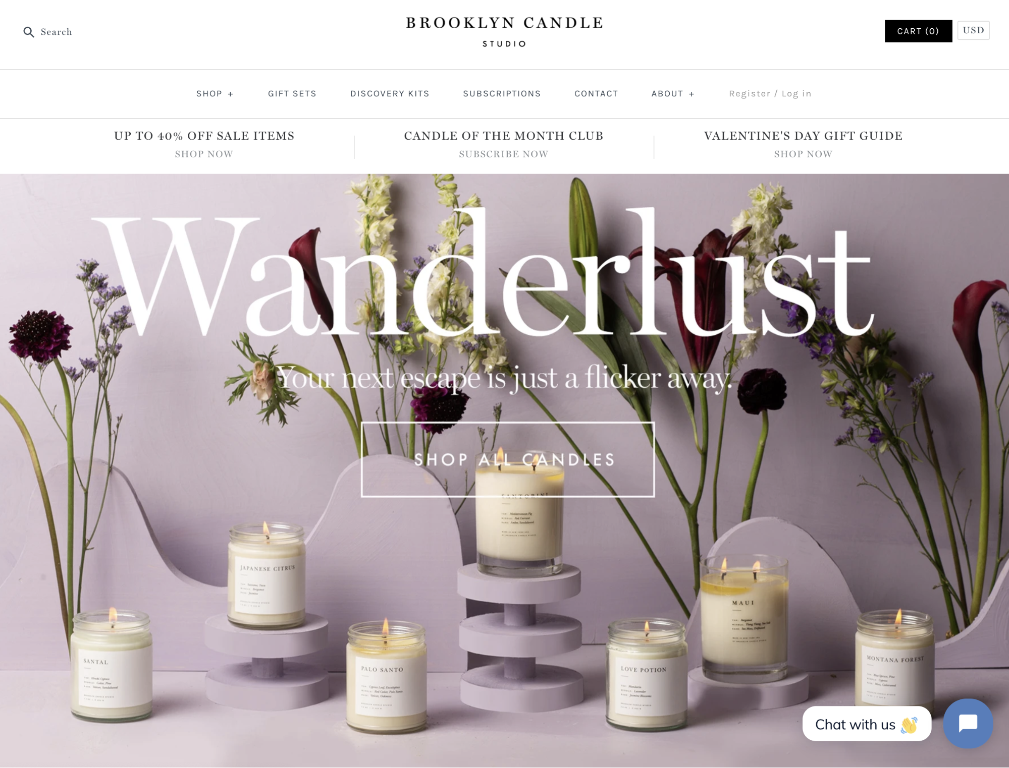 Brooklyn candle studio homepage: “wanderlust,” various candles and flowers arranged together