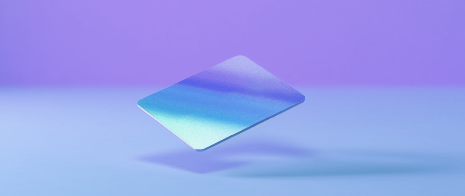 a credit card on a purple and blue background representing building business credit