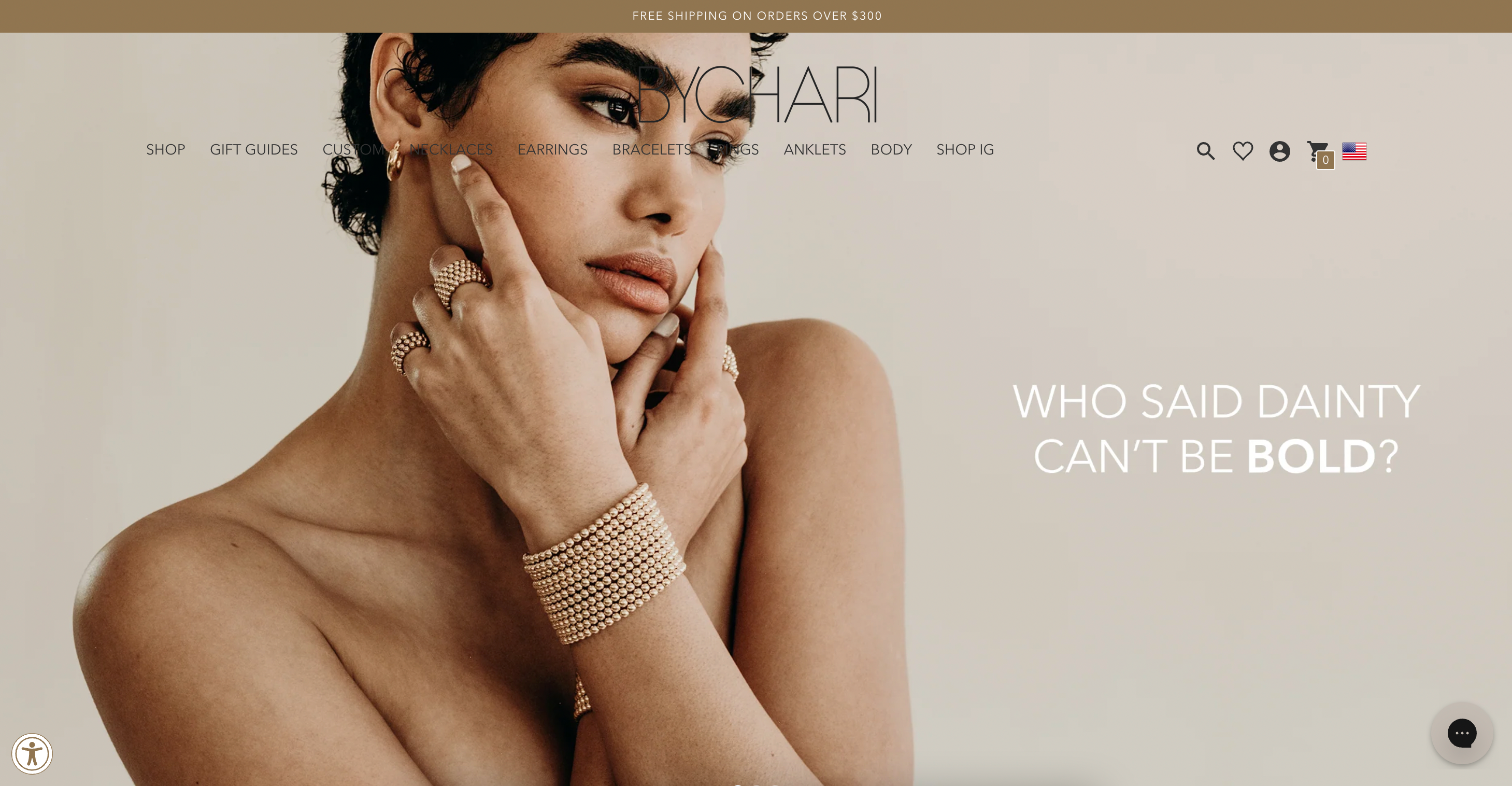 On Bychari's home page, a woman wears stacks of gold bracelets and rings